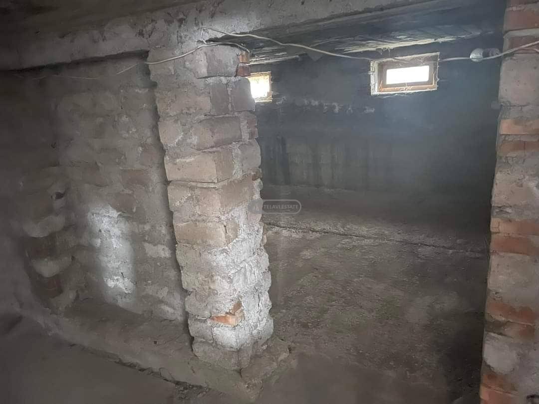 Бельэтажный дом с мансардой в Телави