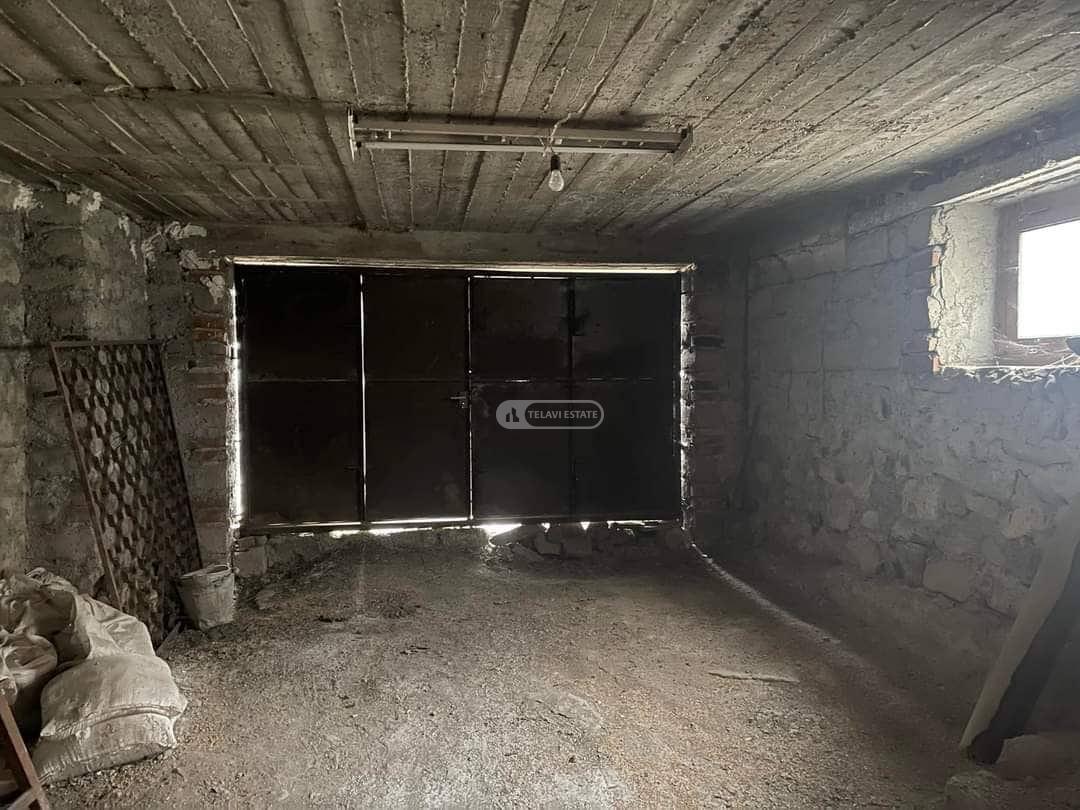 Бельэтажный дом с мансардой в Телави