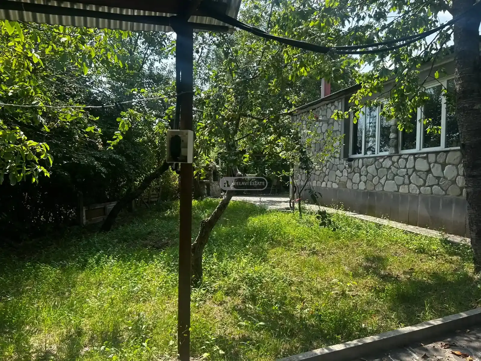 სახლი ზუზუმბოზე