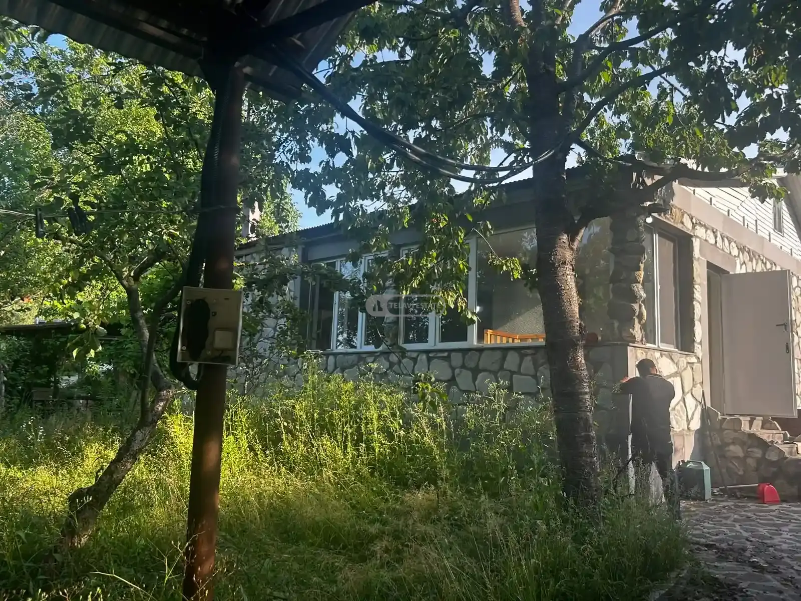 სახლი ზუზუმბოზე